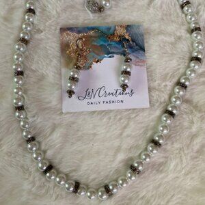 White glass beads with silver separators and earings